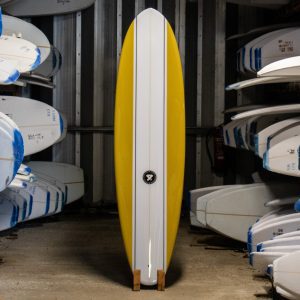 Fourth time piece mid length surfboard - front